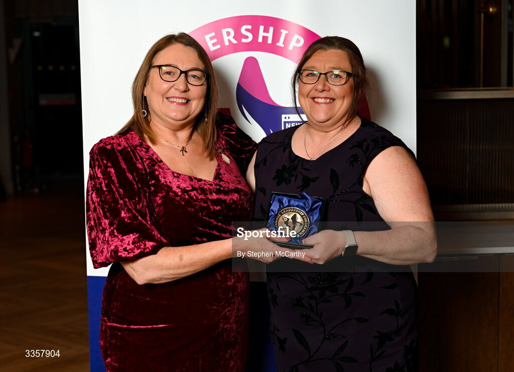 14 February 2026; Helen Rice of Loughinisland GAC, Down, is presented with her graduation medallion by Uachtarán Cumann Peil Gael na mBan Trina Murray at the Learn to Lead LGFA Female Leadership Programme graduation evening at The Carlton Hotel in Santry, Dublin. The Learn to Lead programme was devised to develop the next generation of leaders within Ladies Gaelic Football. Photo by Stephen McCarthy/Sportsfile