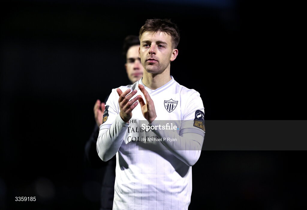 13 February 2026; Dylan Hand of Wexford acknowledges his side's supporters after the SSE Airtricity Men's First Division match between Cobh Ramblers and Wexford at St Colman's Park in Cobh, Cork. Photo by Michael P Ryan/Sportsfile