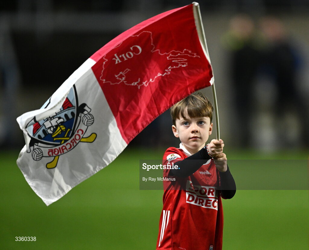 7 February 2026; Cork mascot Cillian Downey waves a flag before the Allianz Hurling League Division 1A match between Cork and Tipperary at SuperValu Páirc Ui Chaoimh in Cork. Photo by Ray McManus/Sportsfile