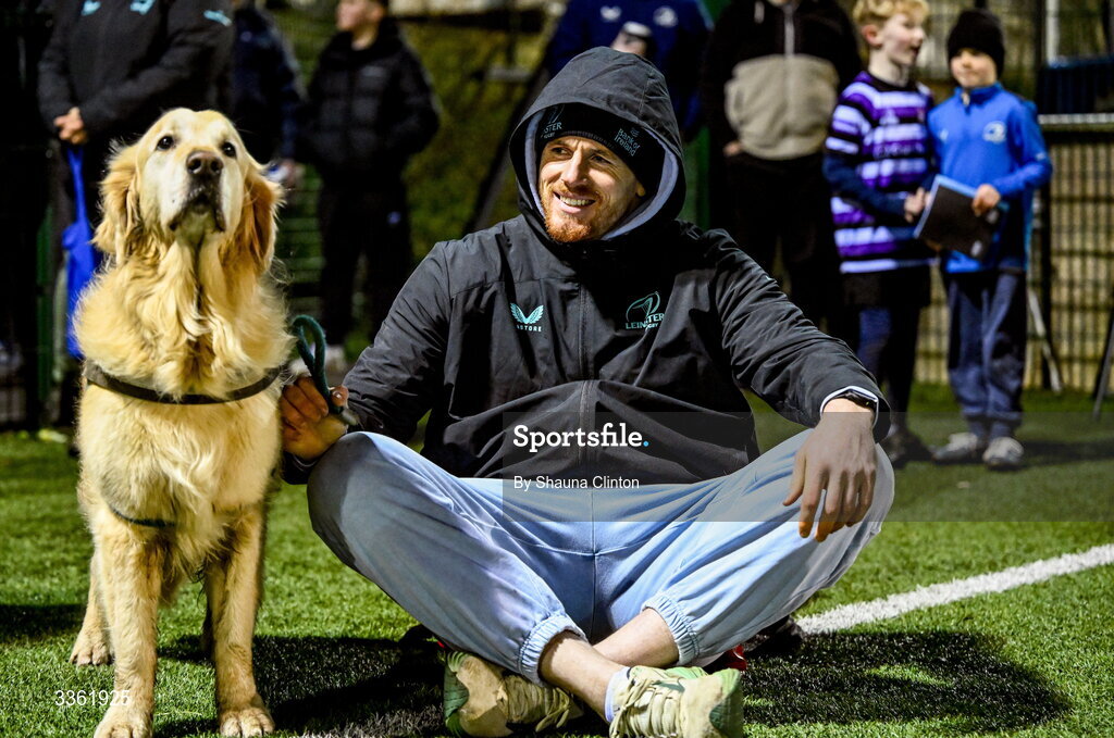 19 February 2026; Ryan Baird with his dog Mackenzie during the Leinster Rugby open training session at Terenure College RFC at Lakelands Park in Dublin. Photo by Shauna Clinton/Sportsfile