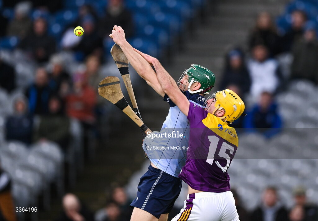 21 February 2026; Chris Crummey of Dublin in action against Tomás Kinsella of Wexford during the Allianz Hurling League Division 1B match between Dublin and Wexford at Croke Park in Dublin. Photo by Stephen McCarthy/Sportsfile