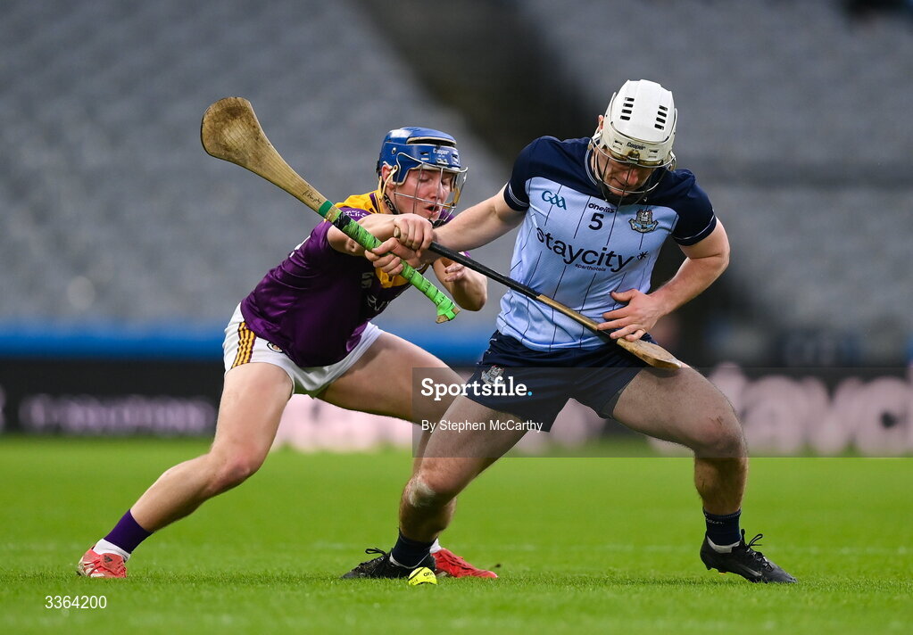 21 February 2026; Andrew Dunphy of Dublin in action against Simon Roche of Wexford during the Allianz Hurling League Division 1B match between Dublin and Wexford at Croke Park in Dublin. Photo by Stephen McCarthy/Sportsfile