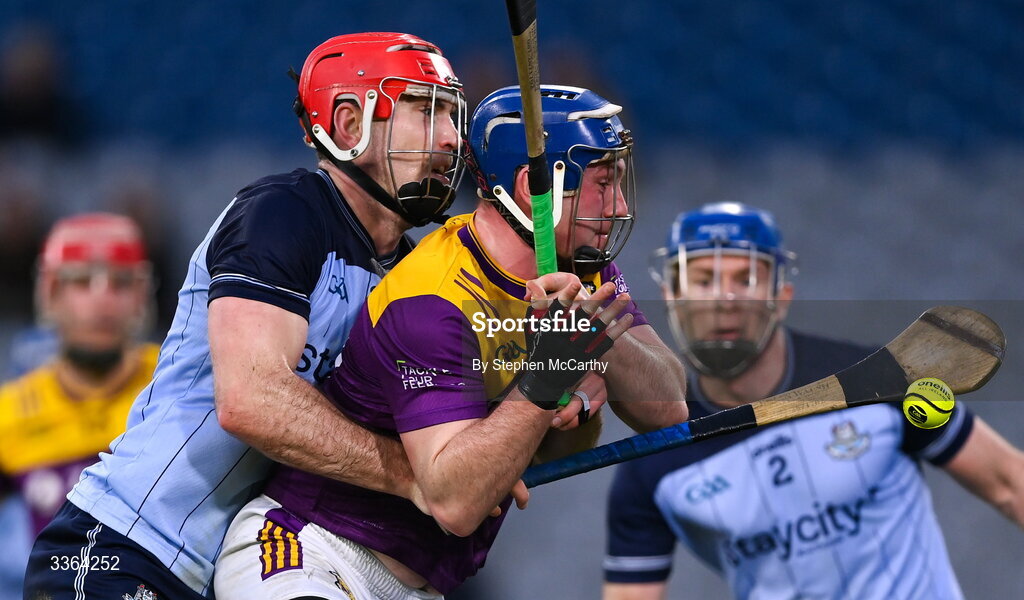 21 February 2026; Kevin Foley of Wexford shoots to score his side's first goal despite the attention of Paddy Smyth of Dublin during the Allianz Hurling League Division 1B match between Dublin and Wexford at Croke Park in Dublin. Photo by Stephen McCarthy/Sportsfile
