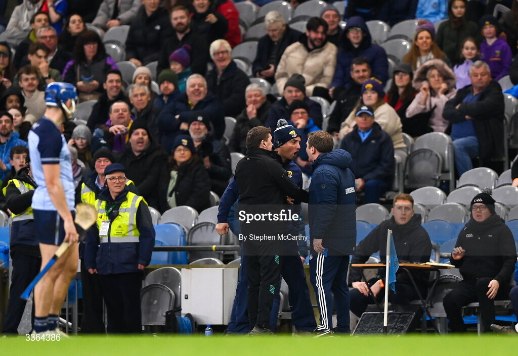 21 February 2026; Wexford manager Keith Rossiter, left, and Dublin manager Niall Ó Ceallacháin exchange views during the Allianz Hurling League Division 1B match between Dublin and Wexford at Croke Park in Dublin. Photo by Stephen McCarthy/Sportsfile