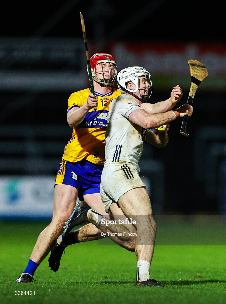21 February 2026; Conan Boran of Kildare in action against Senan Dunford of Clare during the Allianz Hurling League Division 1B match between Kildare and Clare at Cedral St Conleth's Park in Newbridge, Kildare. Photo by Thomas Flinkow/Sportsfile