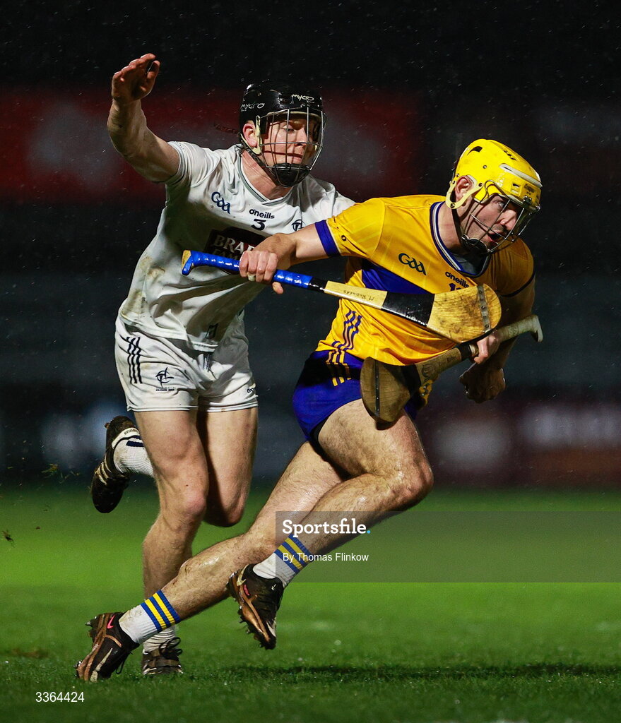 21 February 2026; Mark Rodgers of Clare in action against Rian Boran of Kildare during the Allianz Hurling League Division 1B match between Kildare and Clare at Cedral St Conleth's Park in Newbridge, Kildare. Photo by Thomas Flinkow/Sportsfile