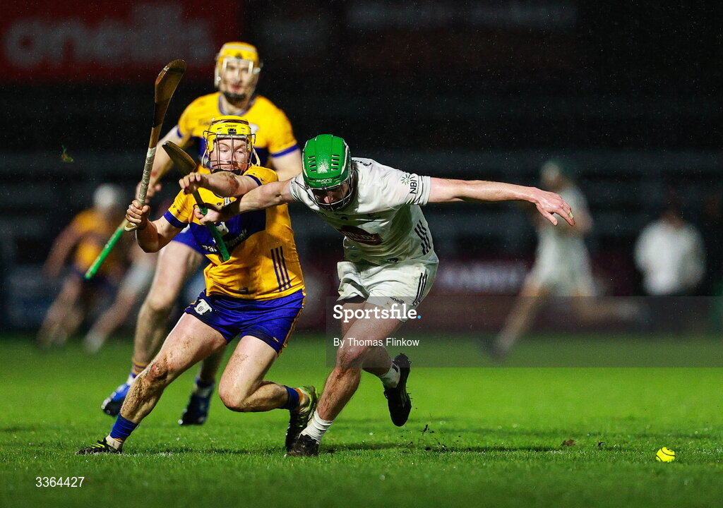21 February 2026; Shane Meehan of Clare in action against Liam O'Reilly of Kildare during the Allianz Hurling League Division 1B match between Kildare and Clare at Cedral St Conleth's Park in Newbridge, Kildare. Photo by Thomas Flinkow/Sportsfile