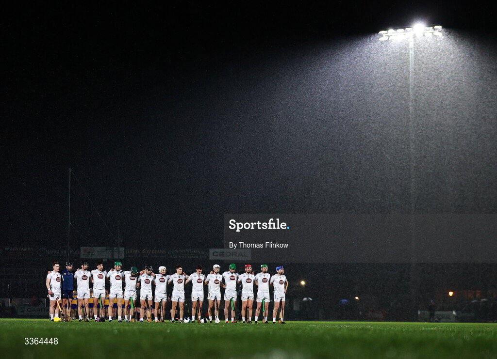 21 February 2026; Kildare players stand for Amhrán na bhFiann before the Allianz Hurling League Division 1B match between Kildare and Clare at Cedral St Conleth's Park in Newbridge, Kildare. Photo by Thomas Flinkow/Sportsfile
