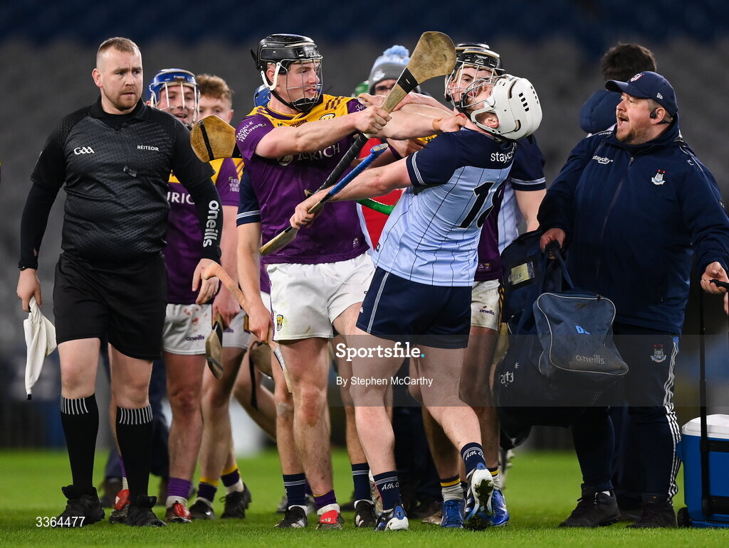 21 February 2026; Conor Foley, left, and Darragh Carley of Wexford with Conor Donohoe of Dublin following the Allianz Hurling League Division 1B match between Dublin and Wexford at Croke Park in Dublin. Photo by Stephen McCarthy/Sportsfile