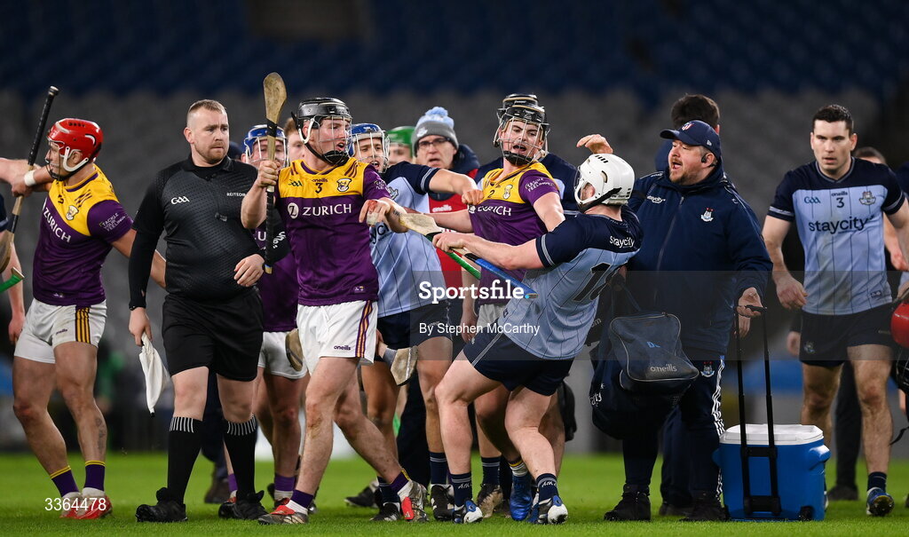 21 February 2026; Conor Foley, left, and Darragh Carley of Wexford with Conor Donohoe of Dublin following the Allianz Hurling League Division 1B match between Dublin and Wexford at Croke Park in Dublin. Photo by Stephen McCarthy/Sportsfile
