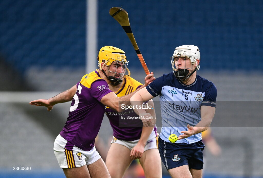 21 February 2026; Andrew Dunphy of Dublin in action against Tomás Kinsella of Wexford during the Allianz Hurling League Division 1B match between Dublin and Wexford at Croke Park in Dublin. Photo by Stephen McCarthy/Sportsfile