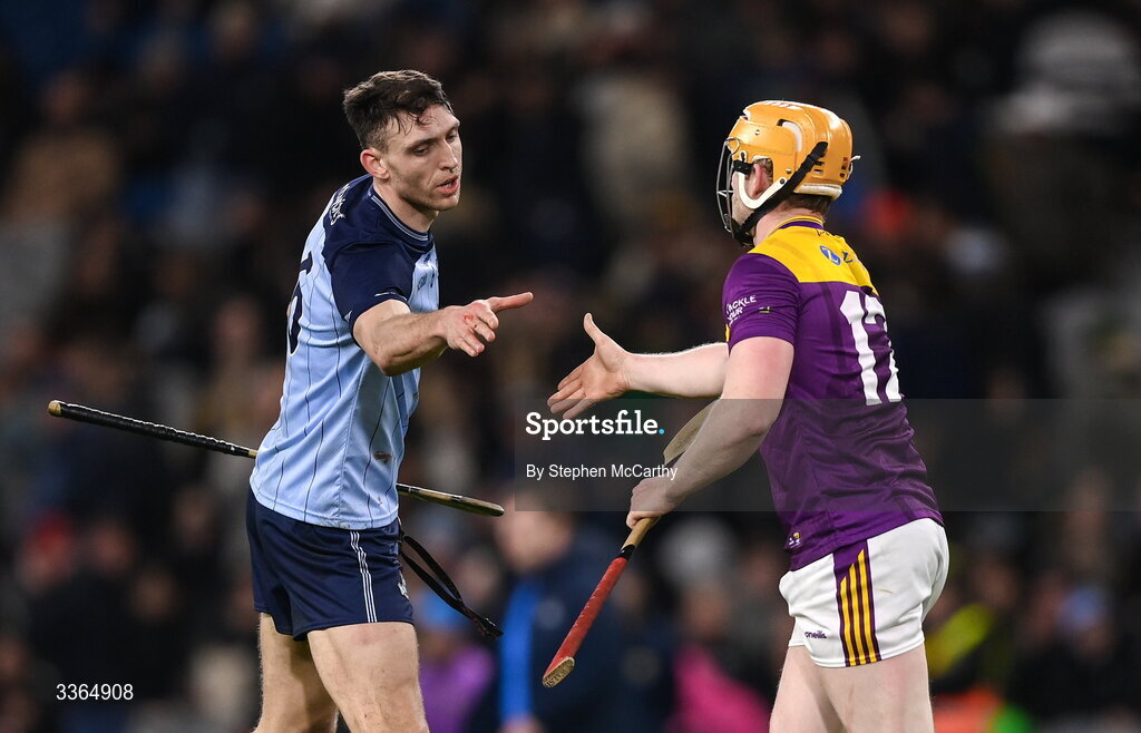 21 February 2026; Chris Crummey of Dublin and Simon Donohoe of Wexford after the Allianz Hurling League Division 1B match between Dublin and Wexford at Croke Park in Dublin. Photo by Stephen McCarthy/Sportsfile
