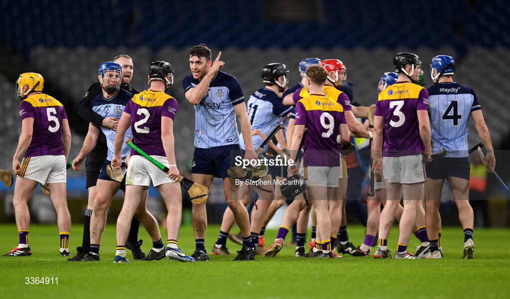 21 February 2026; Chris Crummey of Dublin and Darragh Carley of Wexford after the Allianz Hurling League Division 1B match between Dublin and Wexford at Croke Park in Dublin. Photo by Stephen McCarthy/Sportsfile