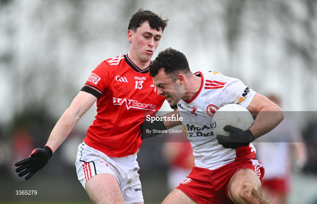 22 February 2026; Michael Rafferty of Tyrone is tackled by Kieran McArdle of Louth during the Allianz Football League Division 2 match between Louth and Tyrone at DEFY Pairc Mhuire in Ardee, Louth. Photo by Shauna Clinton/Sportsfile