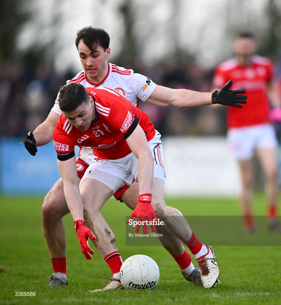 22 February 2026; Conall McKeever of Louth is tackled by Darragh Canavan of Tyrone during the Allianz Football League Division 2 match between Louth and Tyrone at DEFY Pairc Mhuire in Ardee, Louth. Photo by Shauna Clinton/Sportsfile