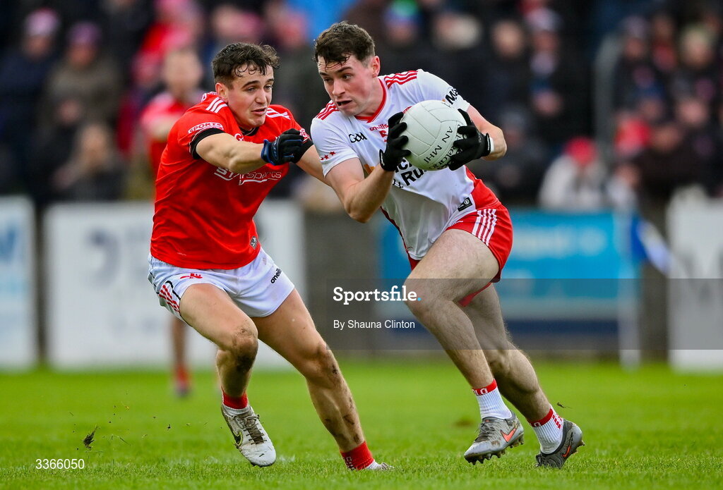 22 February 2026; Aidan Clarke of Tyrone is tackled by Tadhg McDonnell of Louth during the Allianz Football League Division 2 match between Louth and Tyrone at DEFY Pairc Mhuire in Ardee, Louth. Photo by Shauna Clinton/Sportsfile