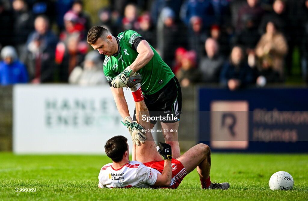 22 February 2026; Louth goalkeeper Niall McDonnell stretches the leg of Darragh Canavan of Tyrone during the Allianz Football League Division 2 match between Louth and Tyrone at DEFY Pairc Mhuire in Ardee, Louth. Photo by Shauna Clinton/Sportsfile