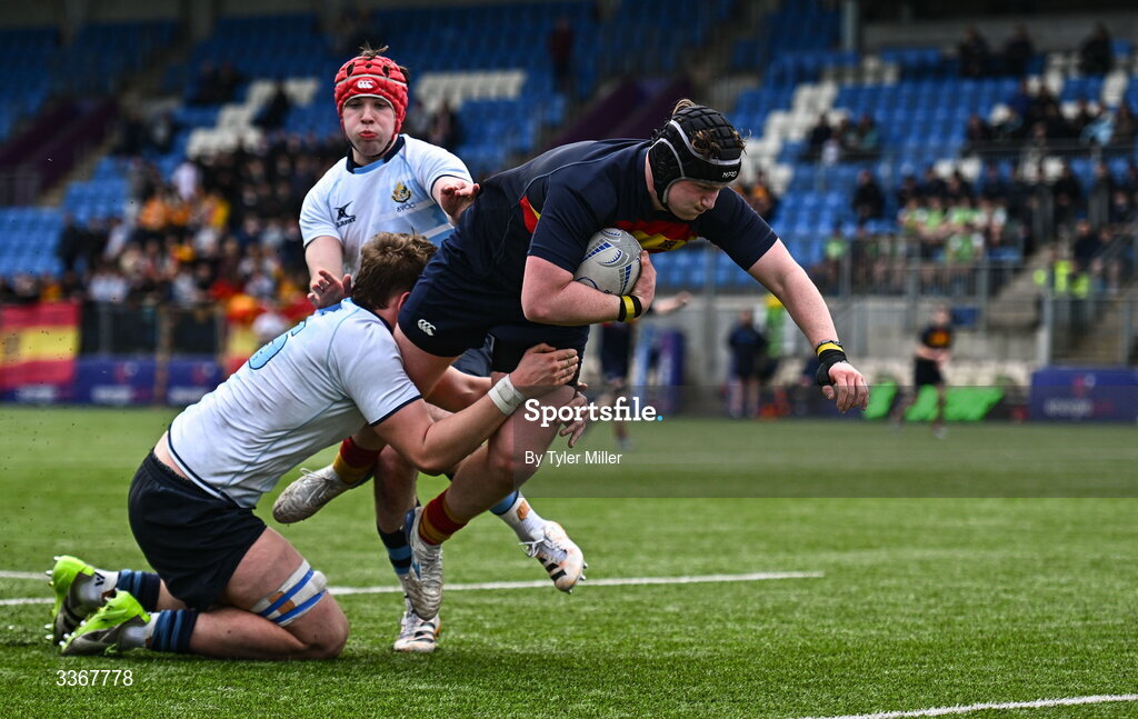 25 February 2026; Benjamin Griffiths of Temple Carrig dives over to score his side's second try despite the efforts of Harry O'Neill of St Vincent's Castleknock College during the Bank of Ireland Leinster Rugby Boys Schools Vinnie Murray Cup semi-final match between St Vincent's Castleknock College and Temple Carrig at Energia Park in Dublin. Photo by Tyler Miller/Sportsfile