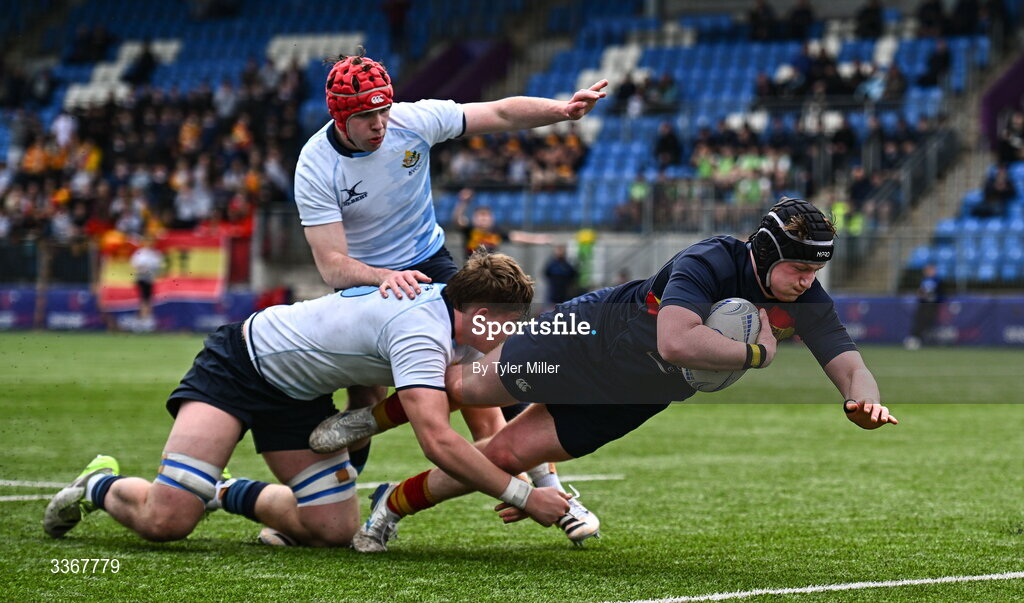 25 February 2026; Benjamin Griffiths of Temple Carrig dives over to score his side's second try despite the efforts of Harry O'Neill of St Vincent's Castleknock College during the Bank of Ireland Leinster Rugby Boys Schools Vinnie Murray Cup semi-final match between St Vincent's Castleknock College and Temple Carrig at Energia Park in Dublin. Photo by Tyler Miller/Sportsfile
