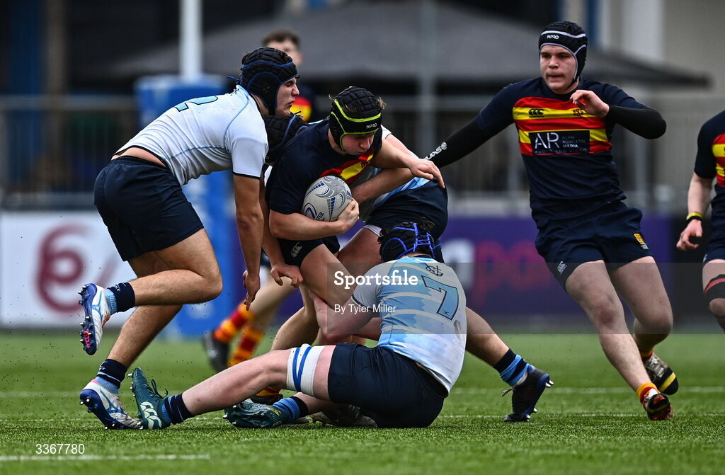 25 February 2026; Daniel Cunningham of Temple Carrig is tackled by Jack Brennan, left, and Luke Hanly of St Vincent's Castleknock College during the Bank of Ireland Leinster Rugby Boys Schools Vinnie Murray Cup semi-final match between St Vincent's Castleknock College and Temple Carrig at Energia Park in Dublin. Photo by Tyler Miller/Sportsfile