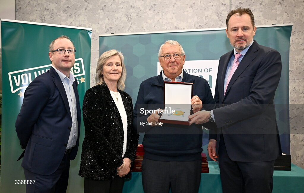 26 February 2026; Patrick Finnerty of Cabinteely Athletic Club, Dublin DLR, is presented with his award by Minister of State at the Department of Culture, Communications and Sport Charlie McConalogue TD, Federation of Irish Sport chair Clare McGrath, and Dun Laoghaire Rathdown Sports Partnership coordinator Shane McArdle, during the Volunteers in Sport Awards 2025, hosted by the Federation of Irish Sport and supported by the National Network of 29 Local Sports Partnerships, at The Crowne Plaza Hotel in Blanchardstown, Dublin. Photo by Seb Daly/Sportsfile