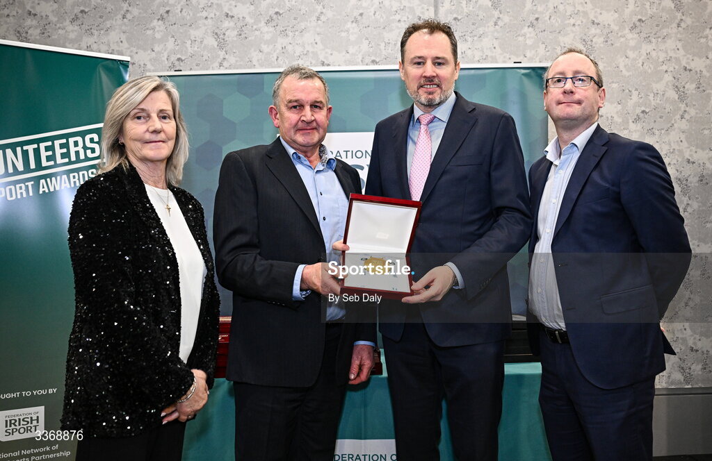 26 February 2026; Tom Loughnane of St Cronan's Athletics Club, Clare, is presented with his award by Minister of State at the Department of Culture, Communications and Sport Charlie McConalogue TD, Federation of Irish Sport chair Clare McGrath, and Dun Laoghaire Rathdown Sports Partnership coordinator Shane McArdle, during the Volunteers in Sport Awards 2025, hosted by the Federation of Irish Sport and supported by the National Network of 29 Local Sports Partnerships, at The Crowne Plaza Hotel in Blanchardstown, Dublin. Photo by Seb Daly/Sportsfile
