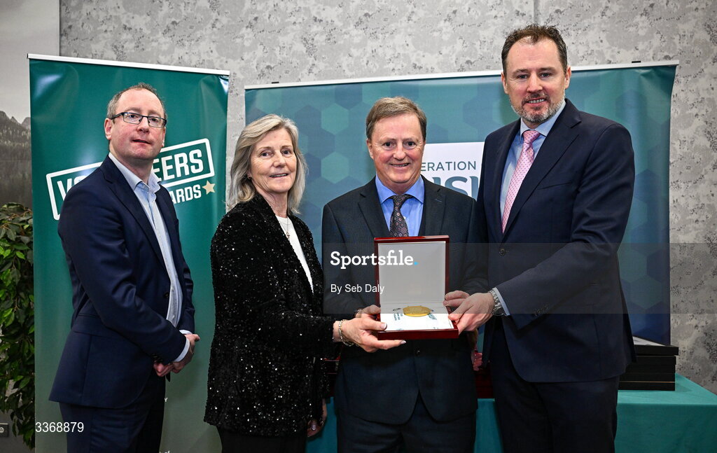 26 February 2026; Sean Minogue of Riverdale Pitch & Putt, Tipperary, is presented with his award by Minister of State at the Department of Culture, Communications and Sport Charlie McConalogue TD, Federation of Irish Sport chair Clare McGrath, and Dun Laoghaire Rathdown Sports Partnership coordinator Shane McArdle, during the Volunteers in Sport Awards 2025, hosted by the Federation of Irish Sport and supported by the National Network of 29 Local Sports Partnerships, at The Crowne Plaza Hotel in Blanchardstown, Dublin. Photo by Seb Daly/Sportsfile