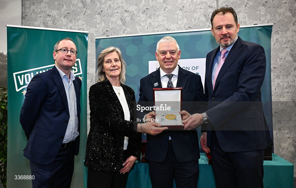 26 February 2026; David Leahy of Castle United AFC, Limerick, is presented with his award by Minister of State at the Department of Culture, Communications and Sport Charlie McConalogue TD, Federation of Irish Sport chair Clare McGrath, and Dun Laoghaire Rathdown Sports Partnership coordinator Shane McArdle, during the Volunteers in Sport Awards 2025, hosted by the Federation of Irish Sport and supported by the National Network of 29 Local Sports Partnerships, at The Crowne Plaza Hotel in Blanchardstown, Dublin. Photo by Seb Daly/Sportsfile