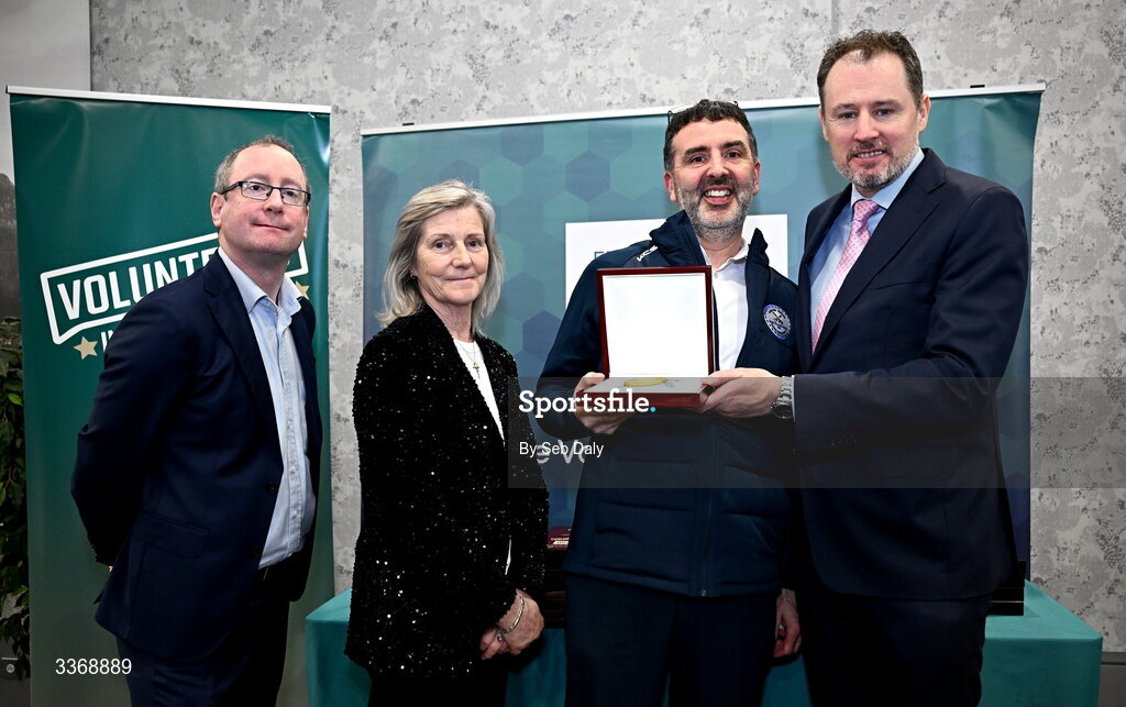 26 February 2026; Simon Racklyeft of Carlow Town Hurling and Camogie Club, Carlow, is presented with his award by Minister of State at the Department of Culture, Communications and Sport Charlie McConalogue TD, Federation of Irish Sport chair Clare McGrath, and Dun Laoghaire Rathdown Sports Partnership coordinator Shane McArdle, during the Volunteers in Sport Awards 2025, hosted by the Federation of Irish Sport and supported by the National Network of 29 Local Sports Partnerships, at The Crowne Plaza Hotel in Blanchardstown, Dublin. Photo by Seb Daly/Sportsfile
