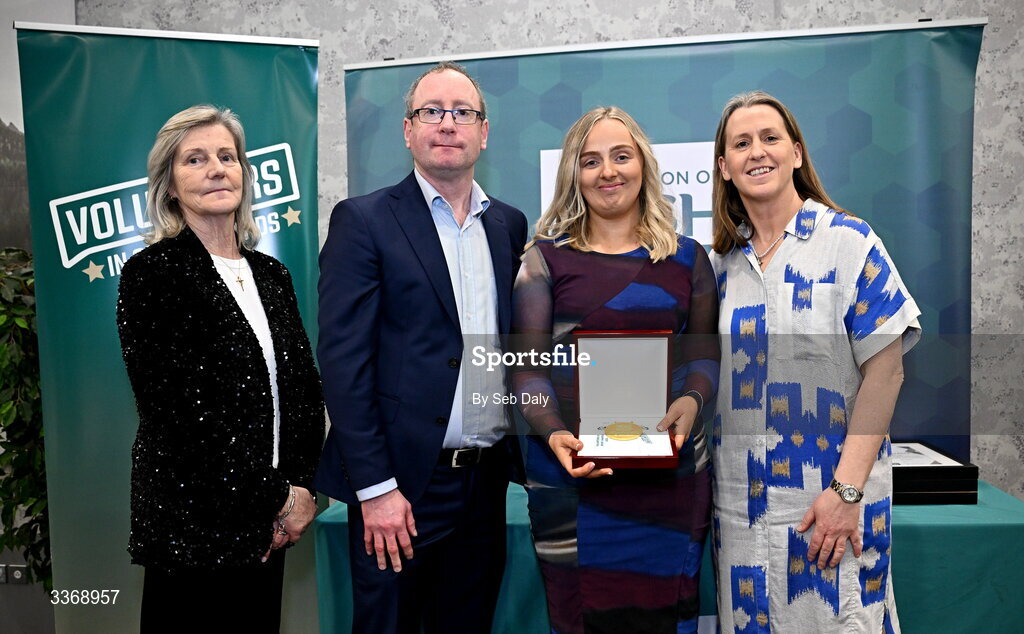 26 February 2026; Emma Montgomery of Glens United Fc, Antrim, is presented with her award by Federation of Irish Sport chief executive officer Mary O'Connor, Federation of Irish Sport chair Clare McGrath, and Dun Laoghaire Rathdown Sports Partnership coordinator Shane McArdle, during the Volunteers in Sport Awards 2025, hosted by the Federation of Irish Sport and supported by the National Network of 29 Local Sports Partnerships, at The Crowne Plaza Hotel in Blanchardstown, Dublin. Photo by Seb Daly/Sportsfile