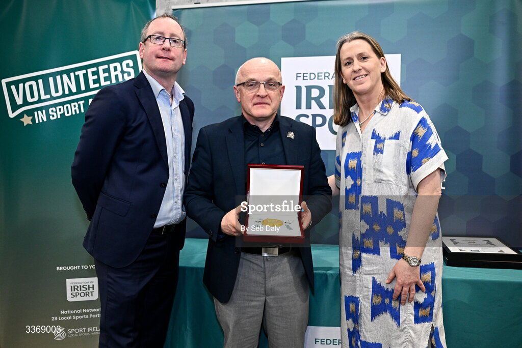 26 February 2026; Rory Clarke of Sligo Rowing Club, Sligo, is presented with his award by Federation of Irish Sport chief executive officer Mary O'Connor, and Dun Laoghaire Rathdown Sports Partnership coordinator Shane McArdle, during the Volunteers in Sport Awards 2025, hosted by the Federation of Irish Sport and supported by the National Network of 29 Local Sports Partnerships, at The Crowne Plaza Hotel in Blanchardstown, Dublin. Photo by Seb Daly/Sportsfile