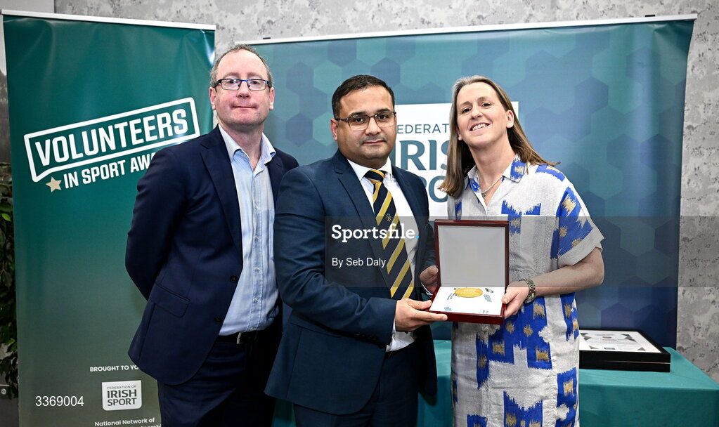 26 February 2026; Arun Babu of County Galway Cricket Club , Galway, is presented with his award by Federation of Irish Sport chief executive officer Mary O'Connor, and Dun Laoghaire Rathdown Sports Partnership coordinator Shane McArdle, during the Volunteers in Sport Awards 2025, hosted by the Federation of Irish Sport and supported by the National Network of 29 Local Sports Partnerships, at The Crowne Plaza Hotel in Blanchardstown, Dublin. Photo by Seb Daly/Sportsfile
