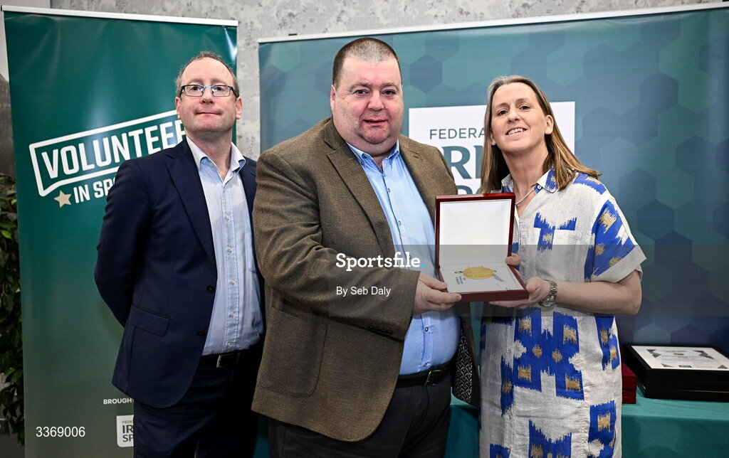 26 February 2026; Garry McGillion of Bishop Kelly Boxing Club, Tyrone, is presented with his award by Federation of Irish Sport chief executive officer Mary O'Connor, and Dun Laoghaire Rathdown Sports Partnership coordinator Shane McArdle, during the Volunteers in Sport Awards 2025, hosted by the Federation of Irish Sport and supported by the National Network of 29 Local Sports Partnerships, at The Crowne Plaza Hotel in Blanchardstown, Dublin. Photo by Seb Daly/Sportsfile