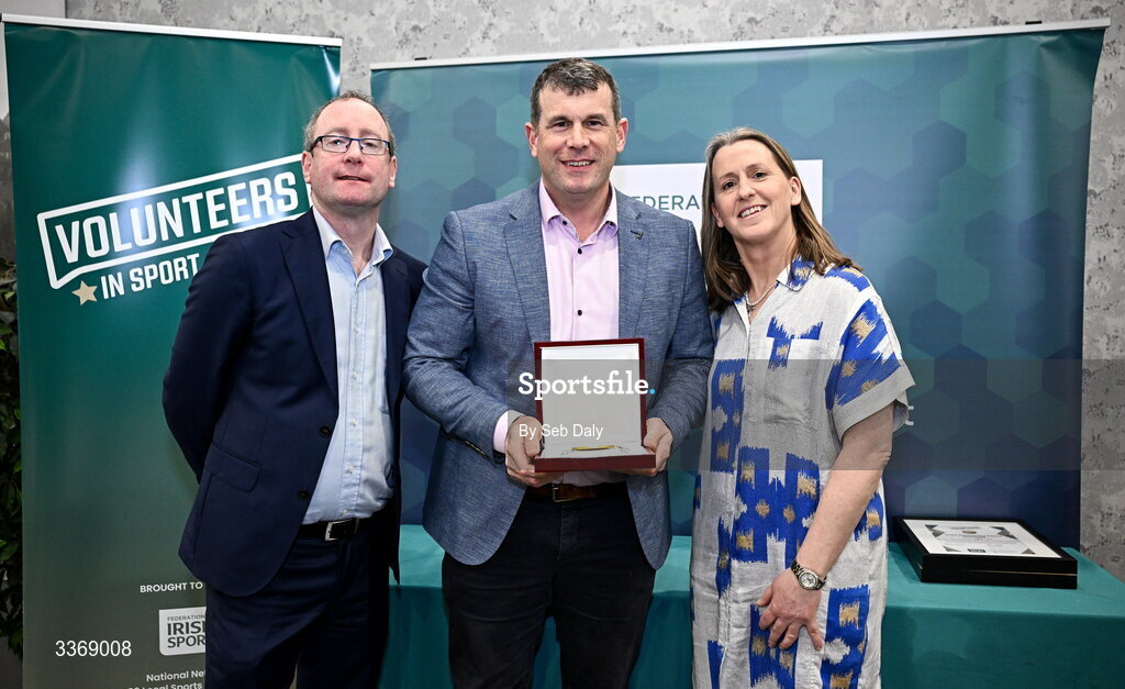 26 February 2026; Anthony Shally of Kilbride GAA, Roscommon, is presented with his award by Federation of Irish Sport chief executive officer Mary O'Connor, and Dun Laoghaire Rathdown Sports Partnership coordinator Shane McArdle, during the Volunteers in Sport Awards 2025, hosted by the Federation of Irish Sport and supported by the National Network of 29 Local Sports Partnerships, at The Crowne Plaza Hotel in Blanchardstown, Dublin. Photo by Seb Daly/Sportsfile