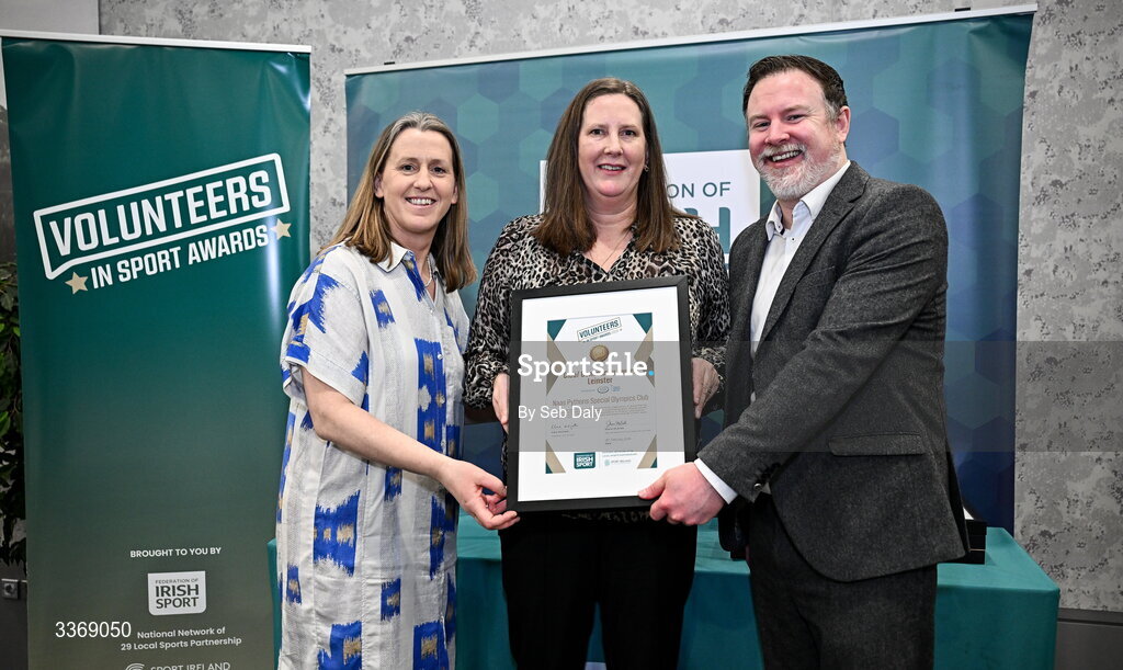 26 February 2026; Suzanne Whelan of Naas Pythons Special Olympics Club, Kildare, is presented with the Leinster Club Award by Clann Credo regional manager Tony Marshall, and Federation of Irish Sport chief executive officer Mary O'Connor, during the Volunteers in Sport Awards 2025, hosted by the Federation of Irish Sport and supported by the National Network of 29 Local Sports Partnerships, at The Crowne Plaza Hotel in Blanchardstown, Dublin. Photo by Seb Daly/Sportsfile