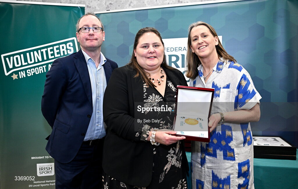 26 February 2026; Kathryn Wylie of Leander Swimming Club, Down, is presented with her award by Federation of Irish Sport chief executive officer Mary O'Connor, and Dun Laoghaire Rathdown Sports Partnership coordinator Shane McArdle, during the Volunteers in Sport Awards 2025, hosted by the Federation of Irish Sport and supported by the National Network of 29 Local Sports Partnerships, at The Crowne Plaza Hotel in Blanchardstown, Dublin. Photo by Seb Daly/Sportsfile