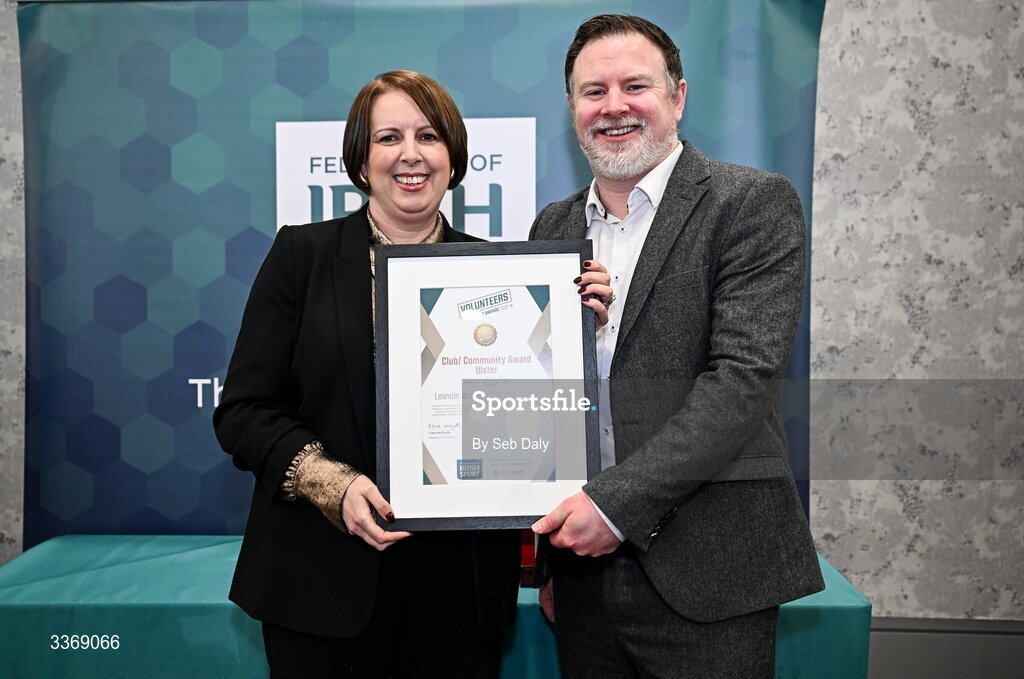 26 February 2026; Helen Lunny of Leander Swimming Club, Down, is presented with the Ulster Club Award by Clann Credo regional manager Tony Marshall, during the Volunteers in Sport Awards 2025, hosted by the Federation of Irish Sport and supported by the National Network of 29 Local Sports Partnerships, at The Crowne Plaza Hotel in Blanchardstown, Dublin. Photo by Seb Daly/Sportsfile