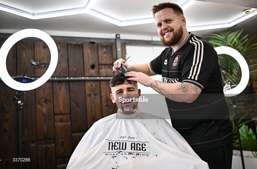 27 February 2026; Bohemians supporter, and owner of New Age Barbers in Phibsborough, Jason Blake gives a haircut to fellow Bohemians supporter Morgan Hughes before the SSE Airtricity Men's Premier Division match between Bohemians and Shamrock Rovers at Dalymount Park in Dublin. Photo by Seb Daly/Sportsfile