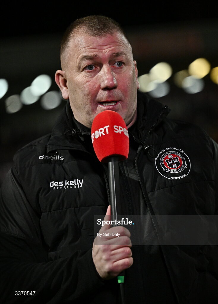27 February 2026; Bohemians manager Alan Reynolds is interviewed for Virgin Media Sport before the SSE Airtricity Men's Premier Division match between Bohemians and Shamrock Rovers at Dalymount Park in Dublin. Photo by Seb Daly/Sportsfile