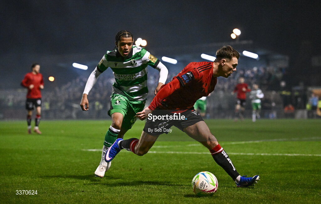 27 February 2026; Dayle Rooney of Bohemians in action against Victor Ozhianvuna of Shamrock Rovers during the SSE Airtricity Men's Premier Division match between Bohemians and Shamrock Rovers at Dalymount Park in Dublin. Photo by Seb Daly/Sportsfile