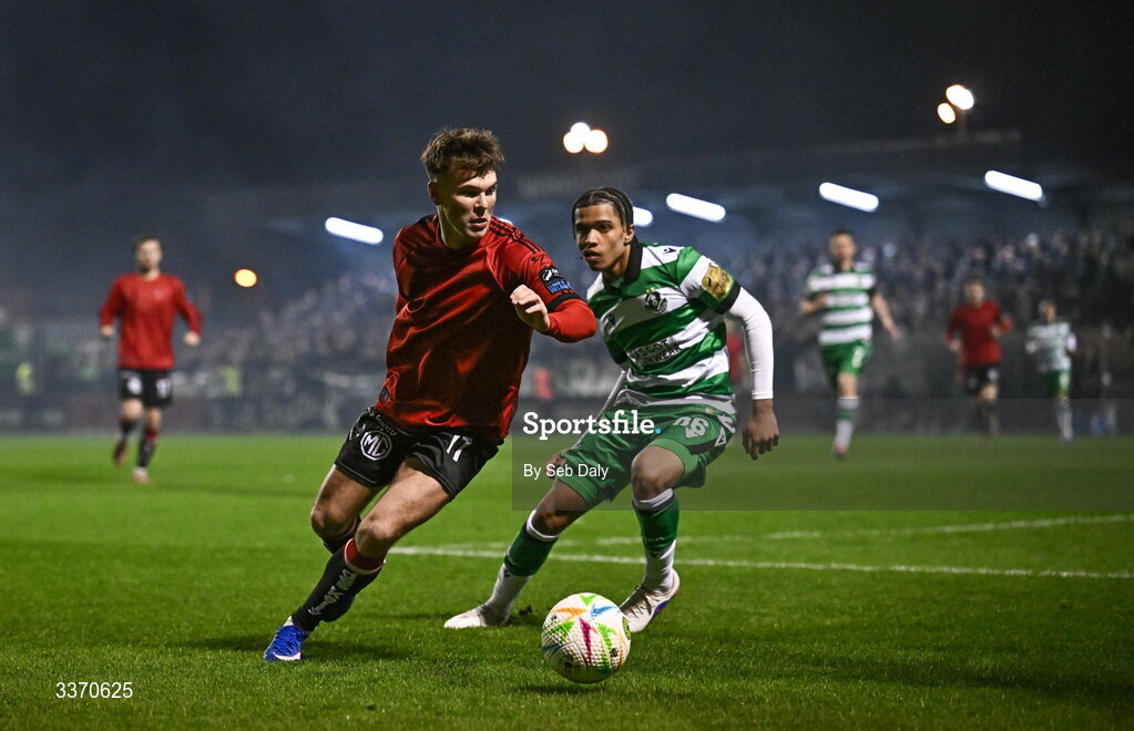 27 February 2026; Dayle Rooney of Bohemians in action against Victor Ozhianvuna of Shamrock Rovers during the SSE Airtricity Men's Premier Division match between Bohemians and Shamrock Rovers at Dalymount Park in Dublin. Photo by Seb Daly/Sportsfile