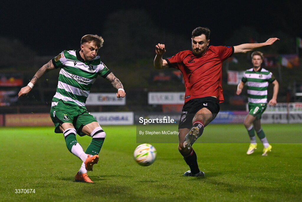 27 February 2026; Danny Grant of Shamrock Rovers in action against Jordan Flores of Bohemians during the SSE Airtricity Men's Premier Division match between Bohemians and Shamrock Rovers at Dalymount Park in Dublin. Photo by Stephen McCarthy/Sportsfile