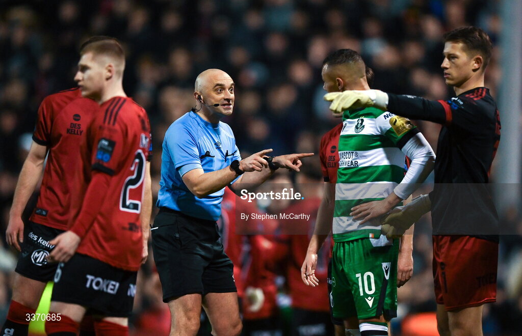 27 February 2026; Referee Neil Doyle speaks with Graham Burke of Shamrock Rovers during the SSE Airtricity Men's Premier Division match between Bohemians and Shamrock Rovers at Dalymount Park in Dublin. Photo by Stephen McCarthy/Sportsfile