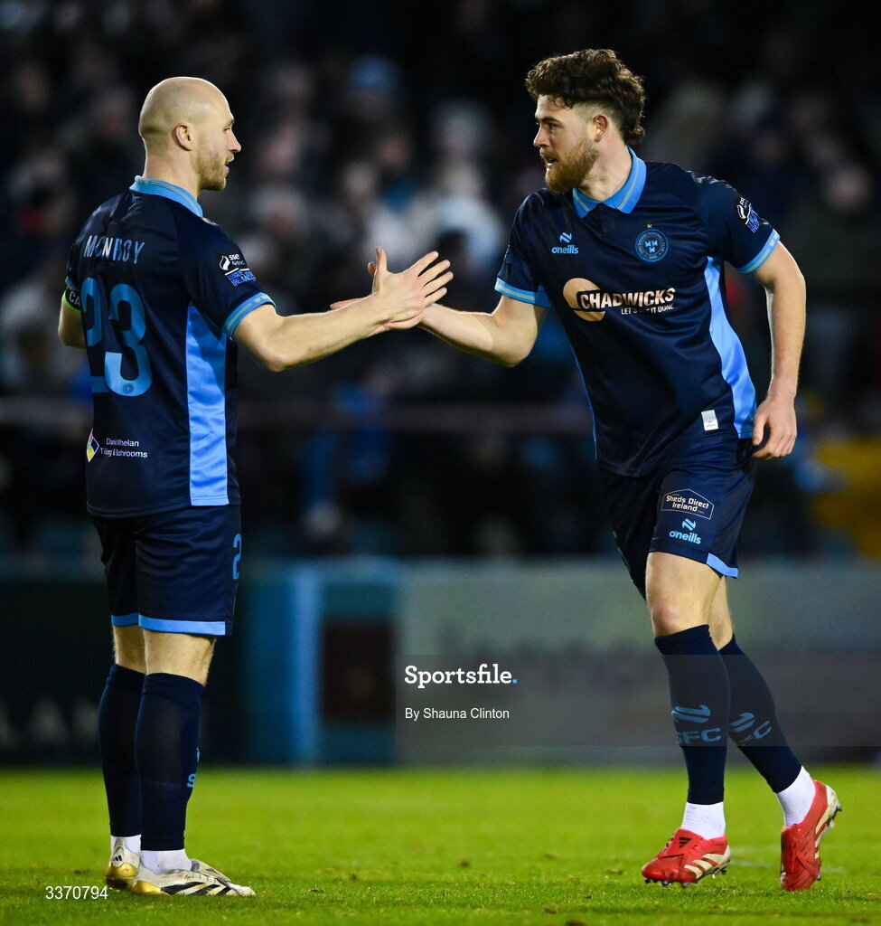 27 February 2026; Sam Bone of Shelbourne, right, celebrates with team-mate Kerr McInroy after scoring his side's first goal during the SSE Airtricity Men's Premier Division match between Drogheda United and Shelbourne at Sullivan & Lambe Park in Drogheda, Louth. Photo by Shauna Clinton/Sportsfile
