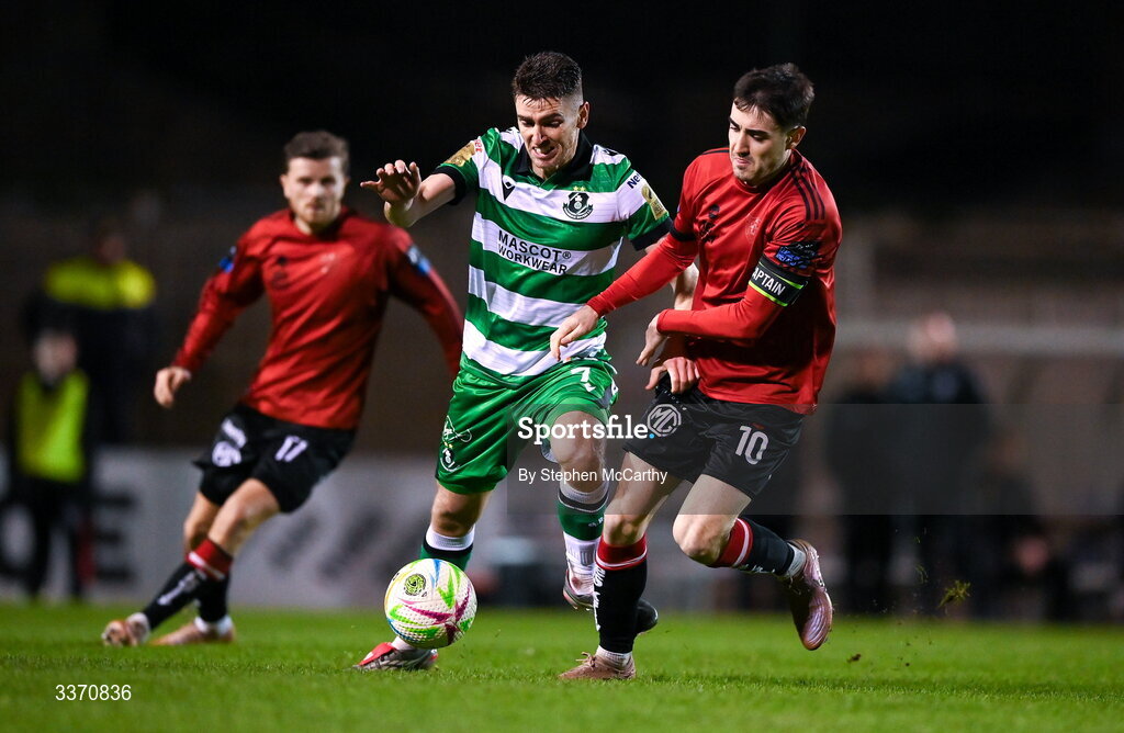 27 February 2026; Dylan Watts of Shamrock Rovers in action against Dawson Devoy of Bohemians during the SSE Airtricity Men's Premier Division match between Bohemians and Shamrock Rovers at Dalymount Park in Dublin. Photo by Stephen McCarthy/Sportsfile