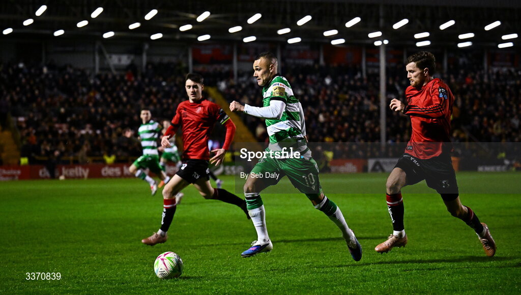 27 February 2026; Graham Burke of Shamrock Rovers in action against Adam McDonnell of Bohemians during the SSE Airtricity Men's Premier Division match between Bohemians and Shamrock Rovers at Dalymount Park in Dublin. Photo by Seb Daly/Sportsfile