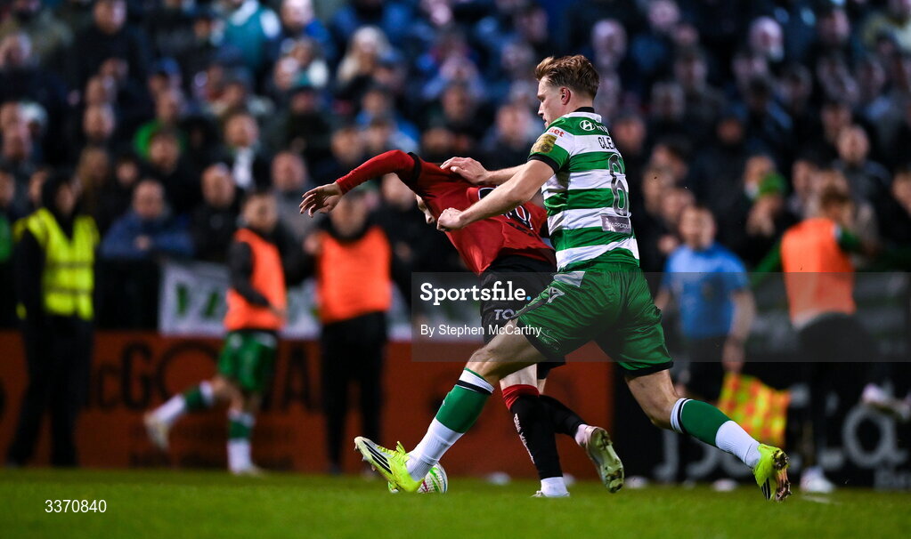 27 February 2026; Ross Tierney of Bohemians is pushed by Daniel Cleary of Shamrock Rovers which resulted in a penalty for Bohemians during the SSE Airtricity Men's Premier Division match between Bohemians and Shamrock Rovers at Dalymount Park in Dublin. Photo by Stephen McCarthy/Sportsfile