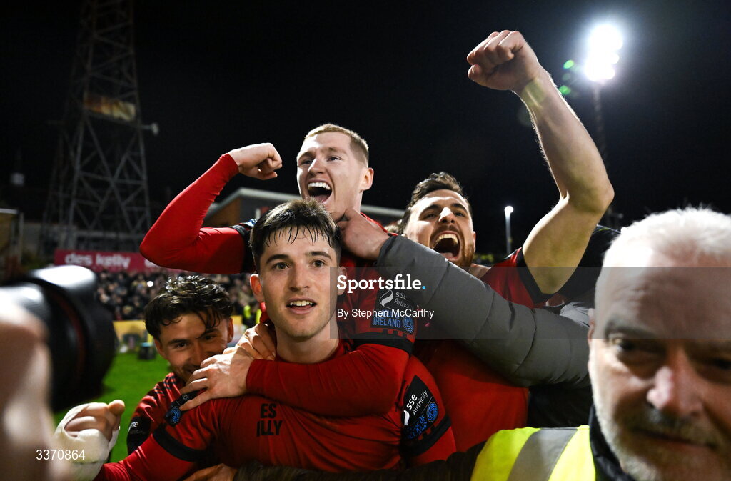 27 February 2026; Colm Whelan of Bohemians, centre, celebrates with teammates, from left, Connor Parsons, Ross Tierney and Jordan Flores after scoring their side's second goal, a penalty, during the SSE Airtricity Men's Premier Division match between Bohemians and Shamrock Rovers at Dalymount Park in Dublin. Photo by Stephen McCarthy/Sportsfile