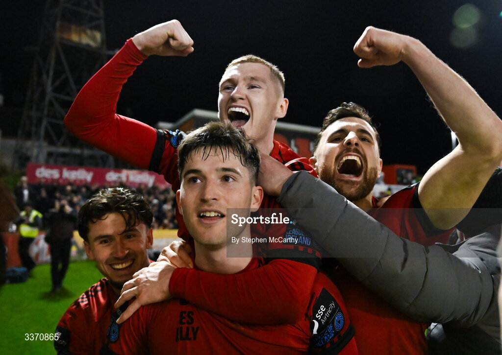 27 February 2026; Colm Whelan of Bohemians, centre, celebrates with teammates, from left, Connor Parsons, Ross Tierney and Jordan Flores after scoring their side's second goal, a penalty, during the SSE Airtricity Men's Premier Division match between Bohemians and Shamrock Rovers at Dalymount Park in Dublin. Photo by Stephen McCarthy/Sportsfile