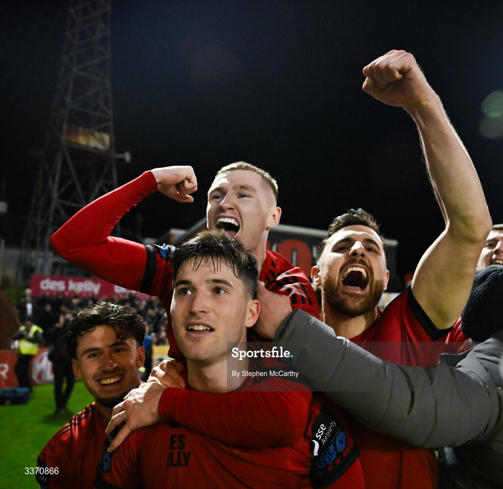 27 February 2026; Colm Whelan of Bohemians, centre, celebrates with teammates, from left, Connor Parsons, Ross Tierney and Jordan Flores after scoring their side's second goal, a penalty, during the SSE Airtricity Men's Premier Division match between Bohemians and Shamrock Rovers at Dalymount Park in Dublin. Photo by Stephen McCarthy/Sportsfile